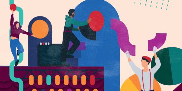 An abstract, textured illustration featuring three people working together to assemble a vibrant, geometric landscape. On the left, a person balances on a teal pipe; in the center, a person on a platform moves a large red circle; and on the right, a person in a beret catches a purple curved shape. The style uses a mix of bold colors like deep blue, magenta, and orange with a grainy, paper-like texture.