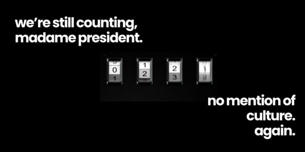 an image of a ticking clock with the words "we're still counting, madame president. no mention of culture. again."